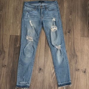 Flying monkey ripped blue jeans